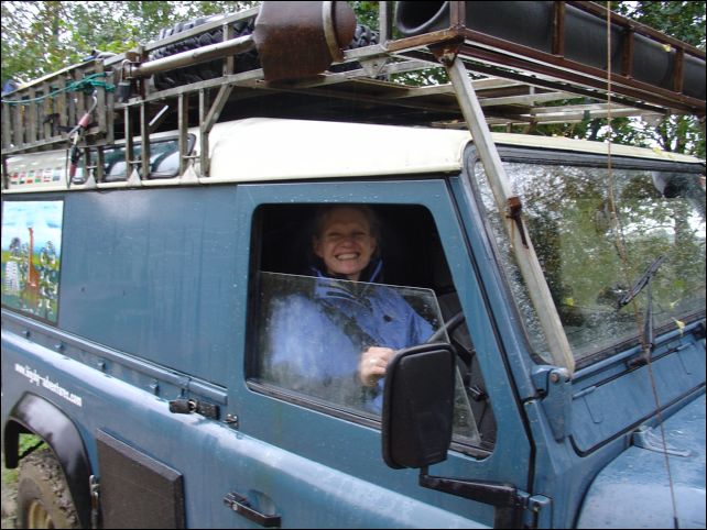 Debbie grinning broadly after getting the Landy unstuck