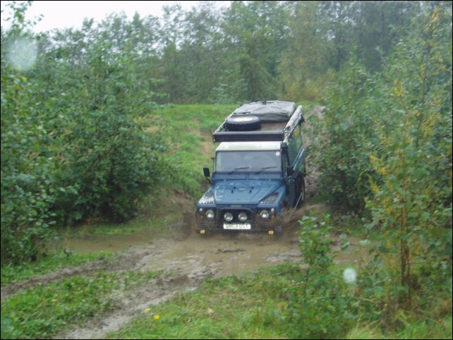 Martin plowing through a muddy rut